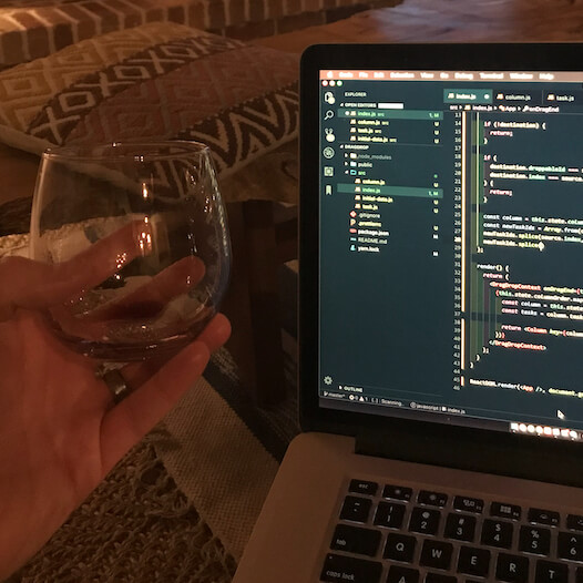 laptop with wine glass