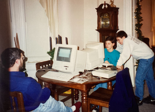 Young Mark sitting at a computer